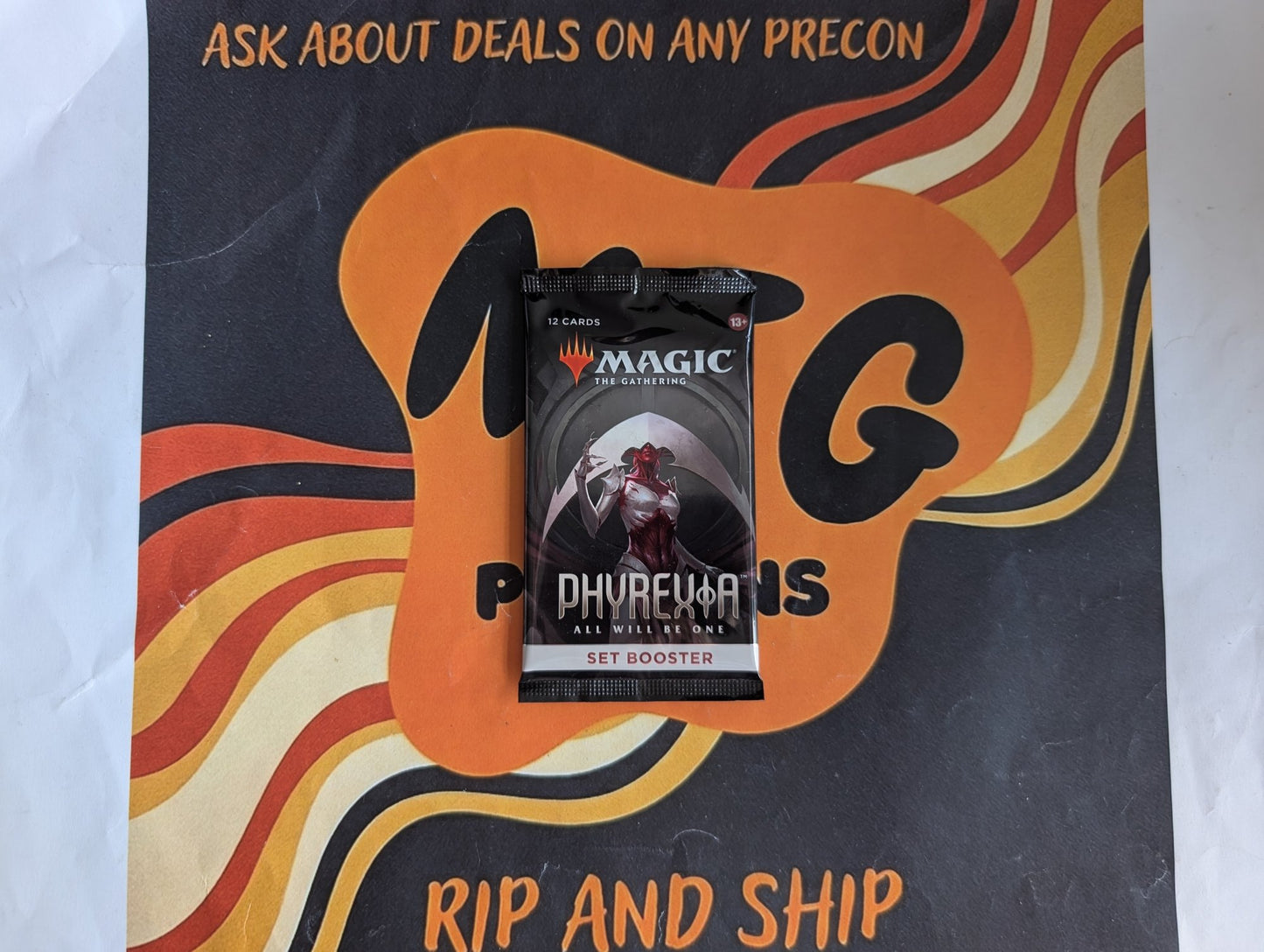 Magic: The Gathering - Phyrexia: All Will Be One Set Booster Pack - real product photo