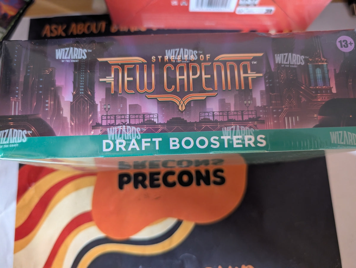 Streets of New Capenna Draft Booster Box — sealed, real product photo (side)